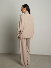 completo in maglia dolcevita - Beige