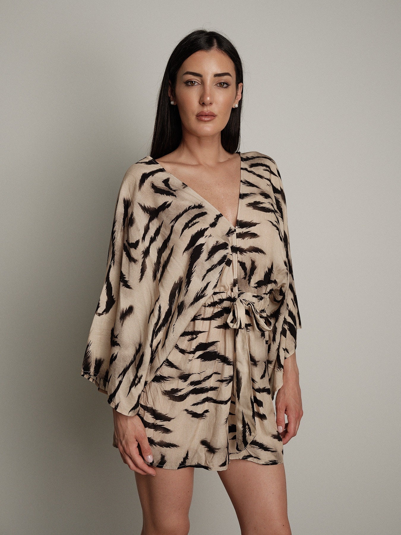Tuta zebra beige