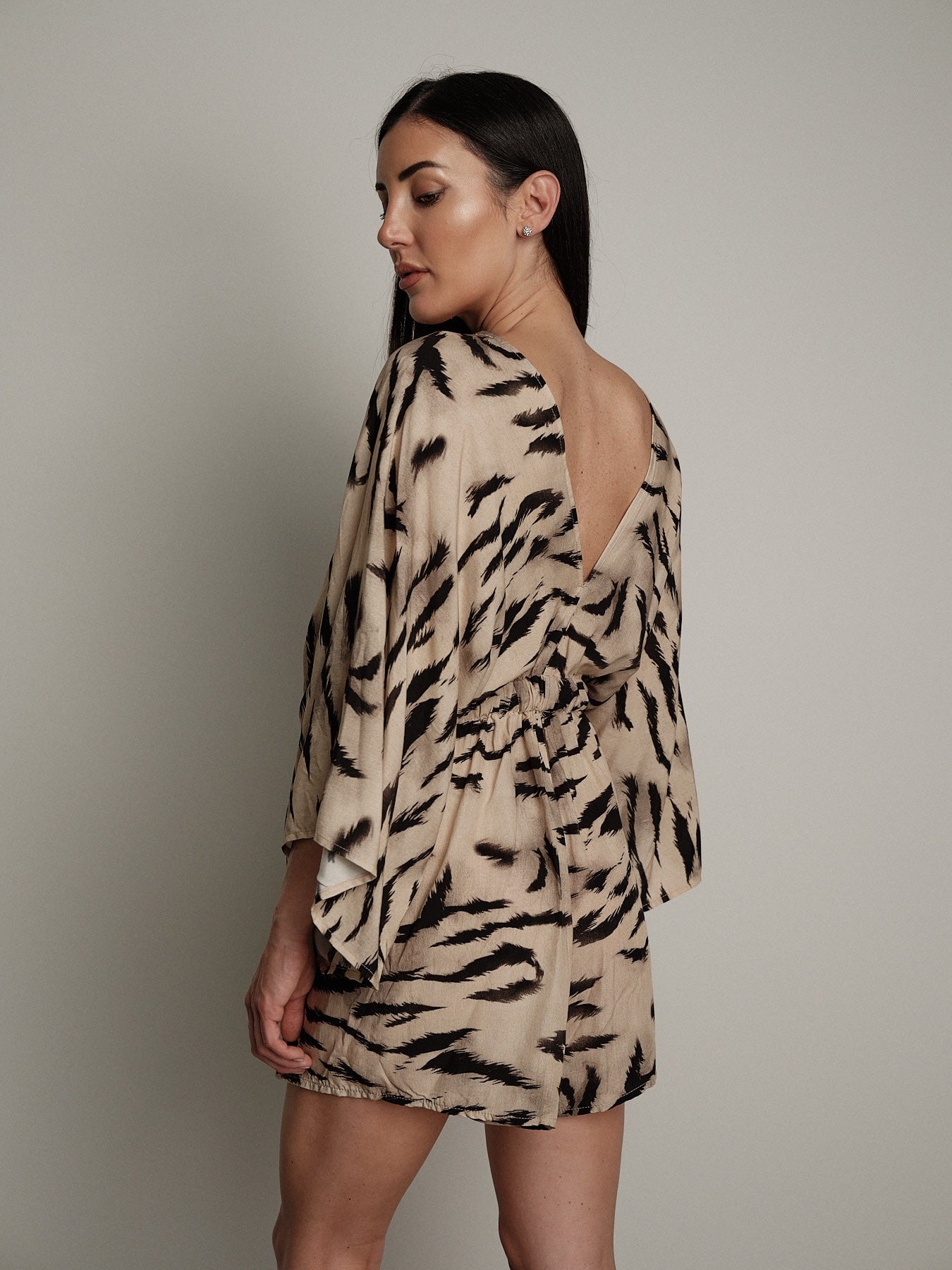 Tuta zebra beige