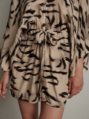 Tuta zebra beige