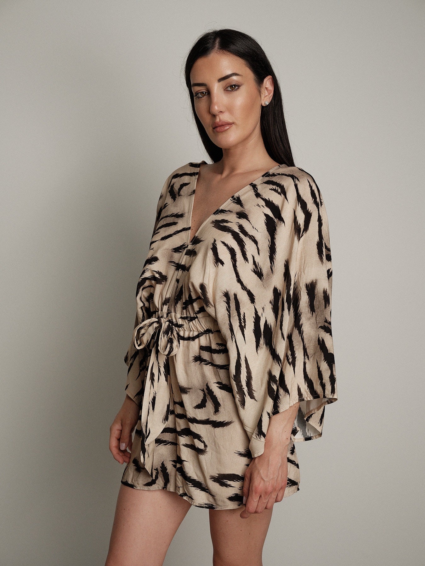 Tuta zebra beige