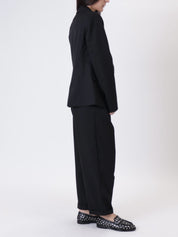 Black "straight" trousers with pleats