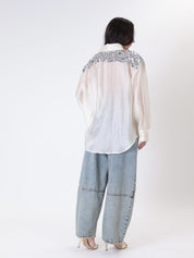 Butter-colored silk-effect shirt with sequined shoulders