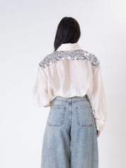 Butter-colored silk-effect shirt with sequined shoulders