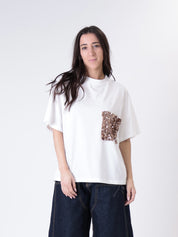 T-shirt bianca tasca paillettes bronzo