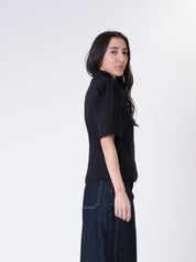 Lady's black puff jacket