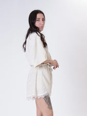 Beige striped shorts with lace trim