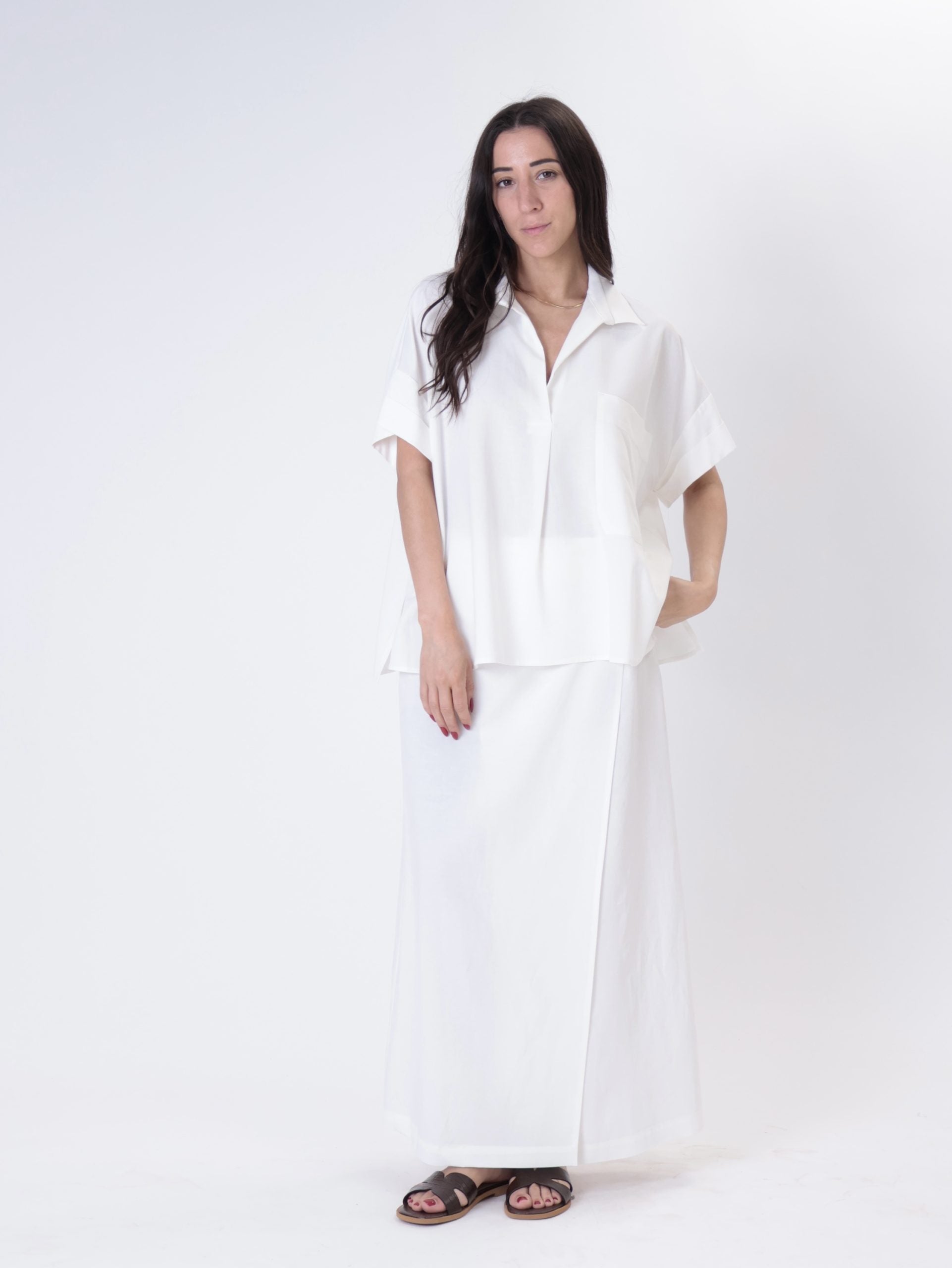 White flowing suit