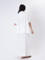 White flowing suit