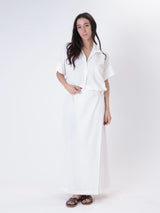 White flowing suit