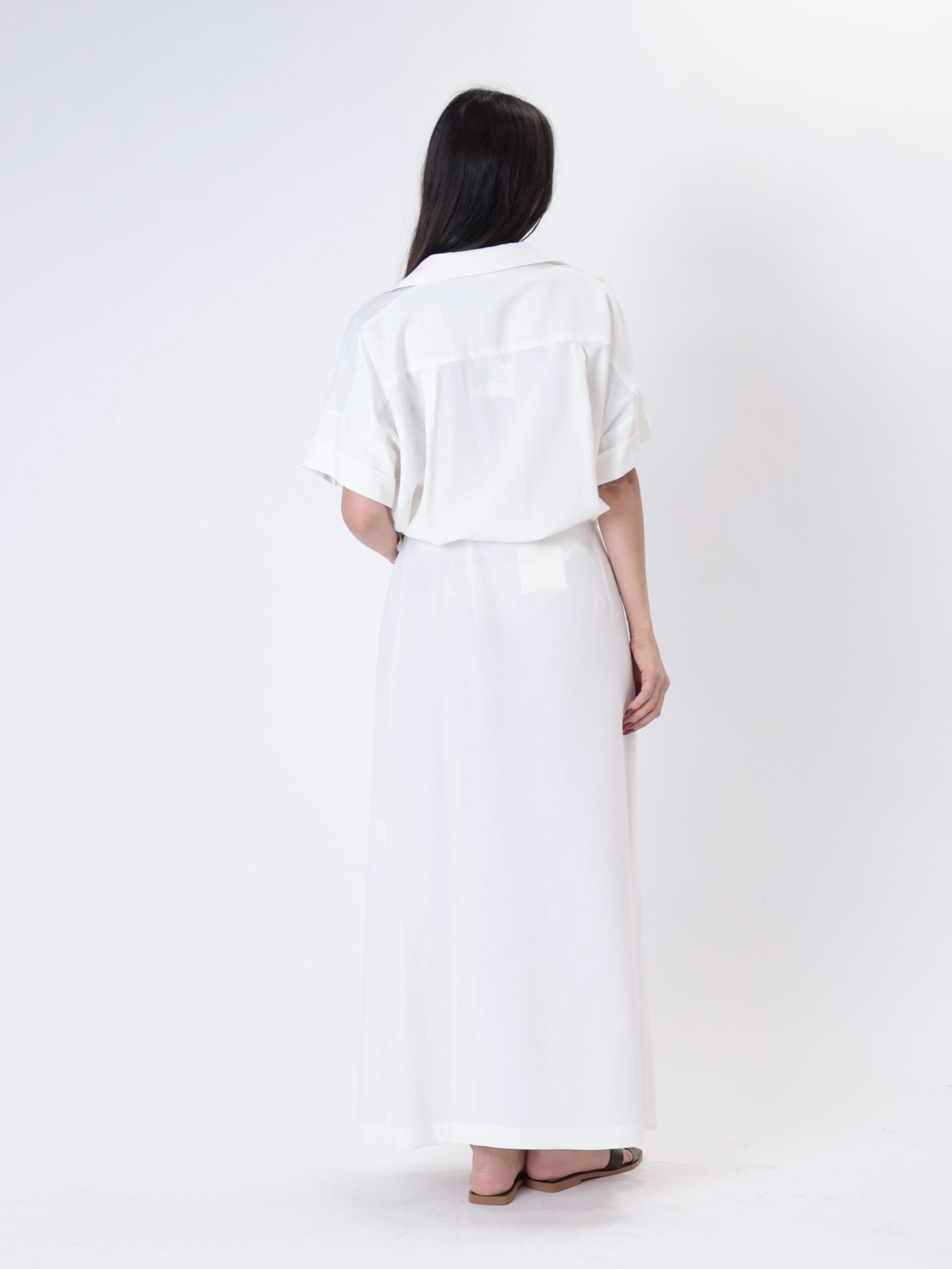 White flowing suit