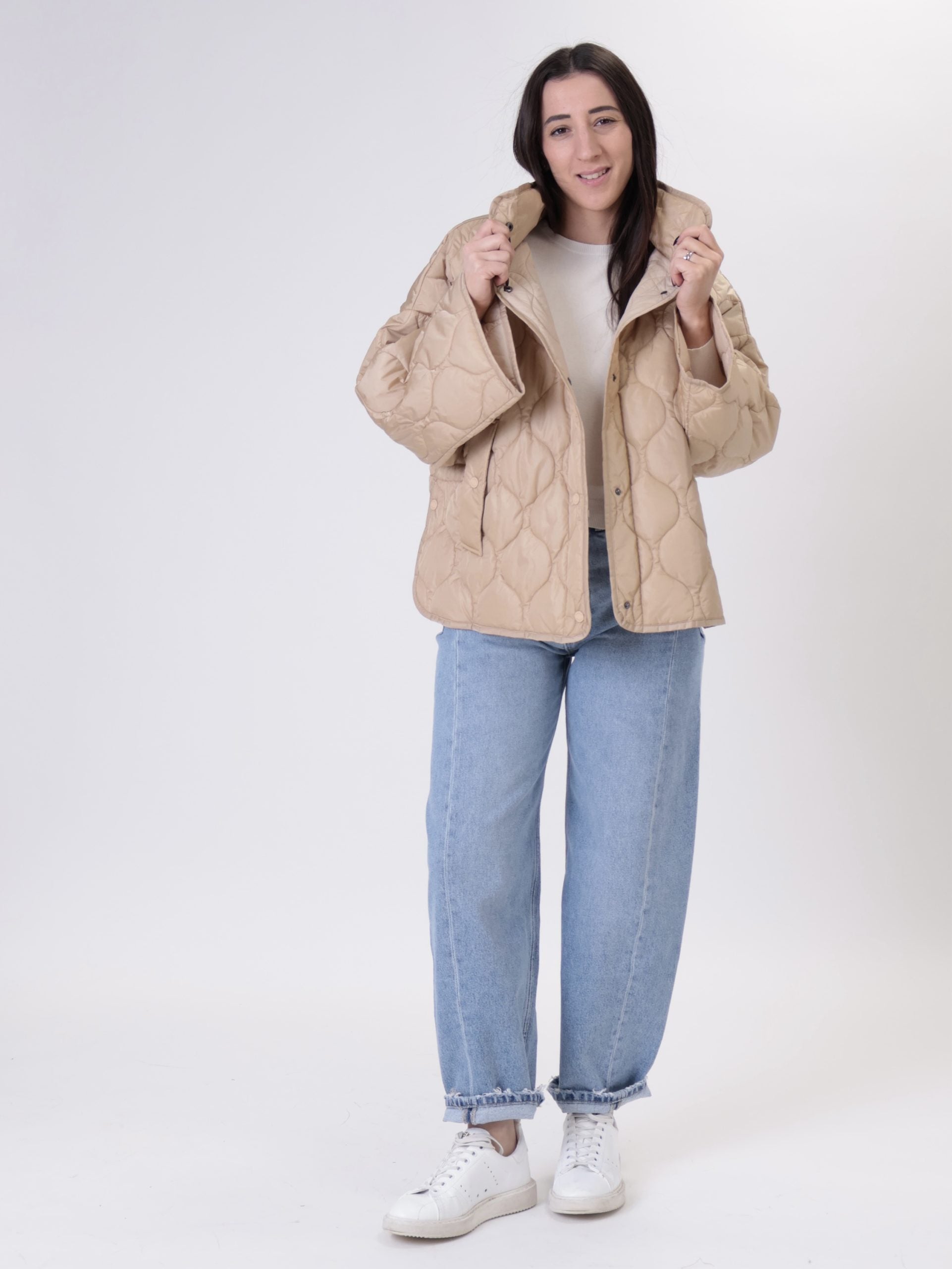 Piumino colletto beige