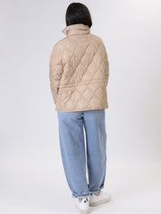 Piumino colletto beige