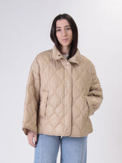 Piumino colletto beige