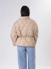 Piumino colletto beige