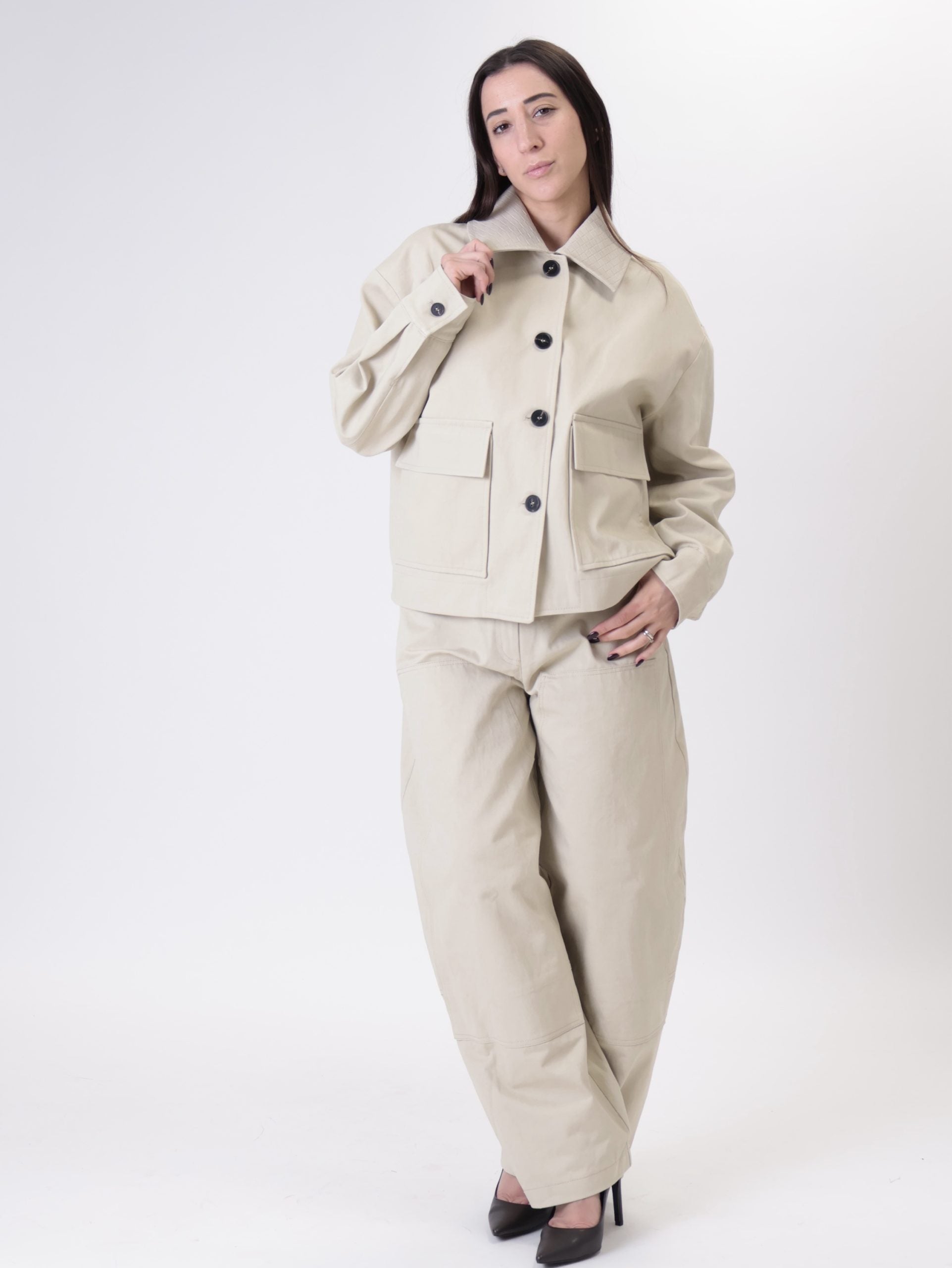Pantalone tasche ecopelle latte