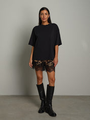 T-shirt ampia Nero Vicolo UAC0170;T-shirt ampia Nero Vicolo UAC0170 — foto 2;T-shirt ampia Nero Vicolo UAC0170 — foto 3;T-shirt ampia Nero Vicolo UAC0170 — foto 4