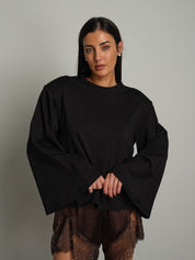 Maglia spalle imbottite manica ampia Nero Vicolo UAC0177;Maglia spalle imbottite manica ampia Nero Vicolo UAC0177 — foto 2;Maglia spalle imbottite manica ampia Nero Vicolo UAC0177 — foto 3;Maglia spalle imbottite manica ampia Nero Vicolo UAC0177 — foto 4;Maglia spalle imbottite manica ampia Nero Vicolo UAC0177 — foto 5