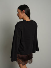 Maglia spalle imbottite manica ampia Nero Vicolo UAC0177;Maglia spalle imbottite manica ampia Nero Vicolo UAC0177 — foto 2;Maglia spalle imbottite manica ampia Nero Vicolo UAC0177 — foto 3;Maglia spalle imbottite manica ampia Nero Vicolo UAC0177 — foto 4;Maglia spalle imbottite manica ampia Nero Vicolo UAC0177 — foto 5